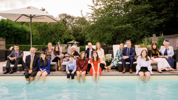 A family at wedding at Sanctum on the green hotel, Windsor by Guy Aubertin wedding photographer